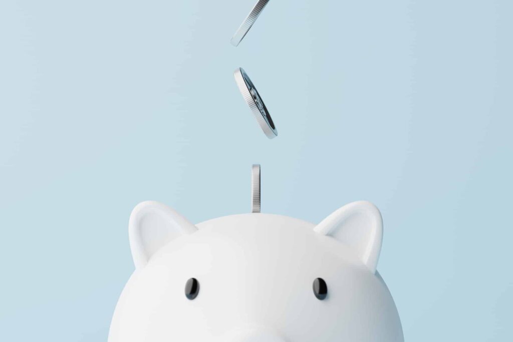 The Top Canadian Dividend Stock I’d Trust for My Nest Egg Silver coins fall into a piggy bank.